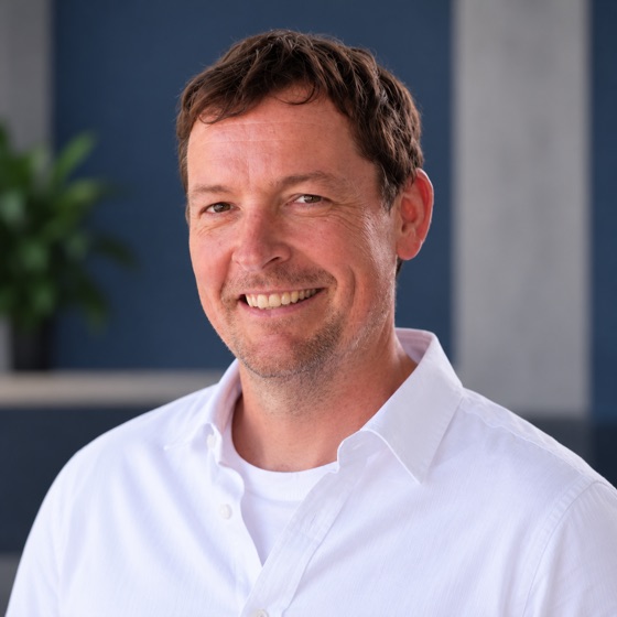 David Vaughan, photographed against the FutureSafe office wall